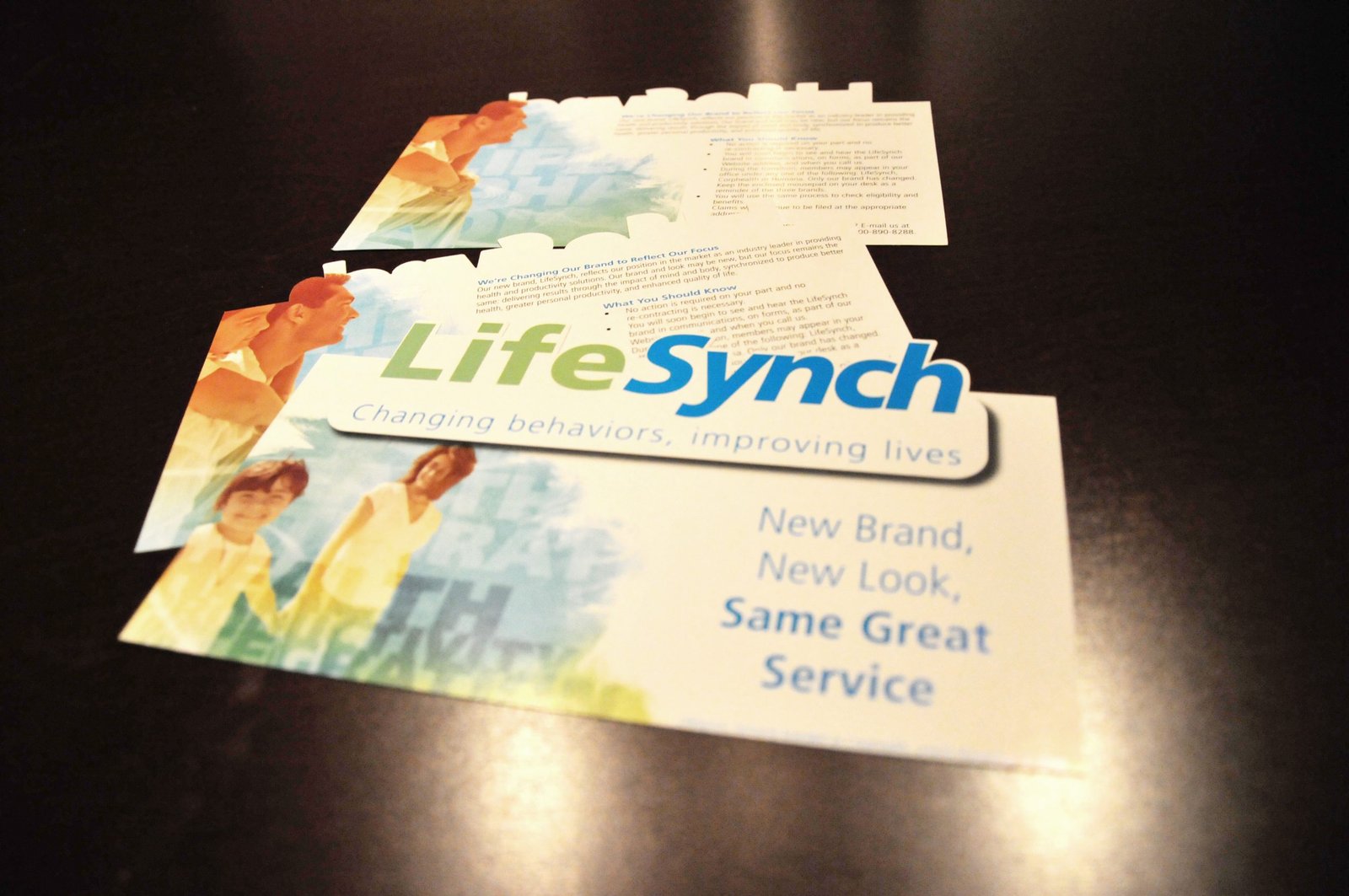 LifeSynch die-cut rebranding announcement mailer
